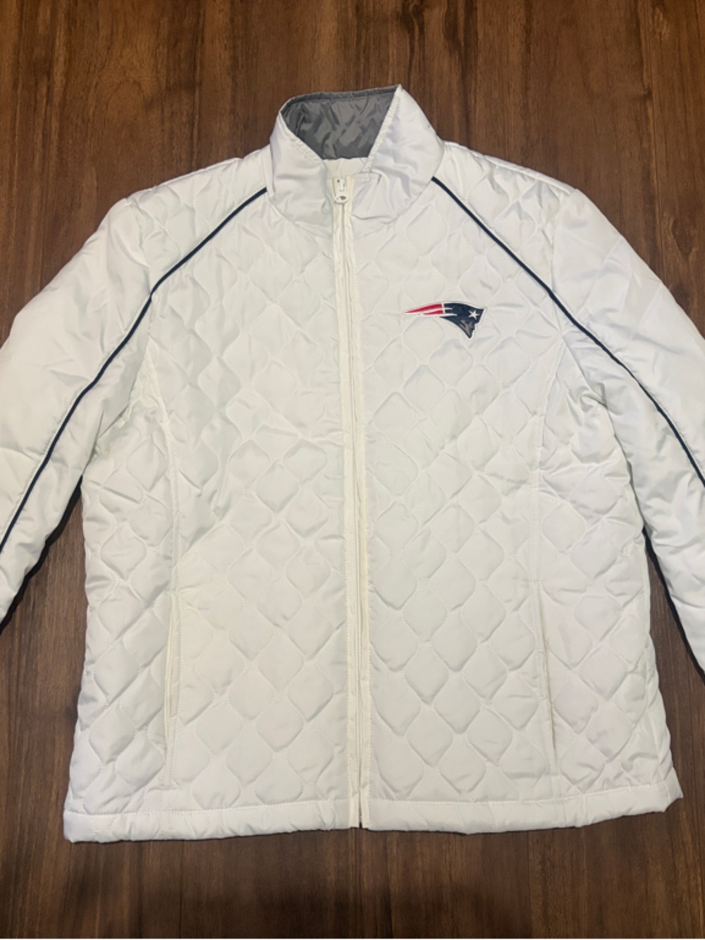 NFL White Quilted Jacket with Navy Detailing and Red, White & Blue Shield Patch
